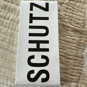 A brand new pair of upscale flip flop by SCHUTZ!
